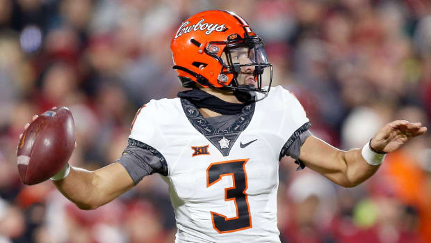 Oklahoma State quarterback Spencer Sanders throws a pass during the game vs. Oklahoma.